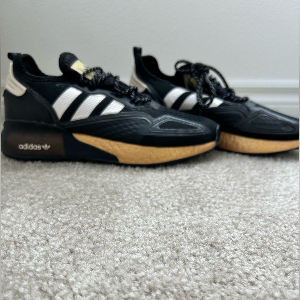 Adidas Originals ZX 2K Boost in black and gold. Only worn twice. No box. Men’s 8